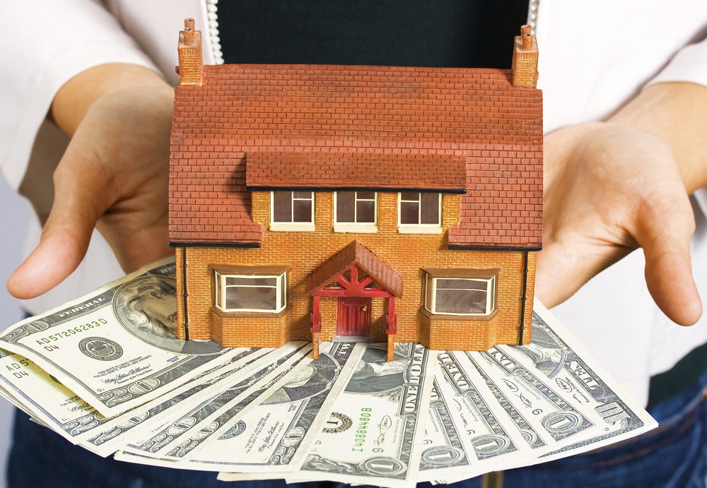 Can you pull money out of 401k and invest in real estate?